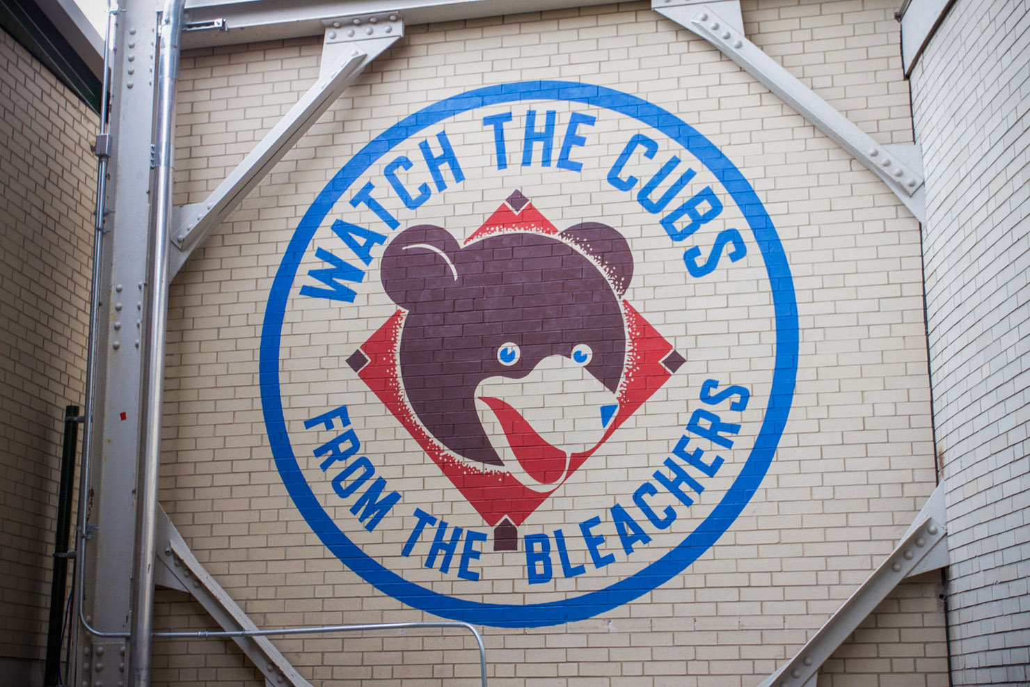 The Cubs — with no fans in the Wrigley Field bleachers — fill the space  with advertising signage